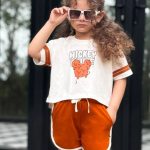 ست کراپ و شلوارک MICKEY NZDE با جنس سوپر پنبه فول لایکرا، ضدحساسیت و بدون دون، مناسب سنین 2 تا نوجوان